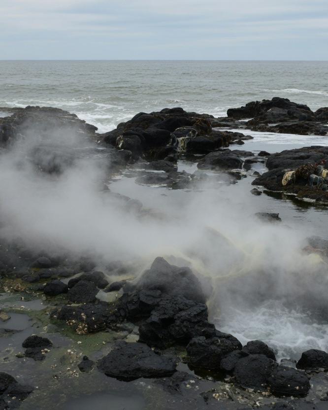 Steam on coastal rock