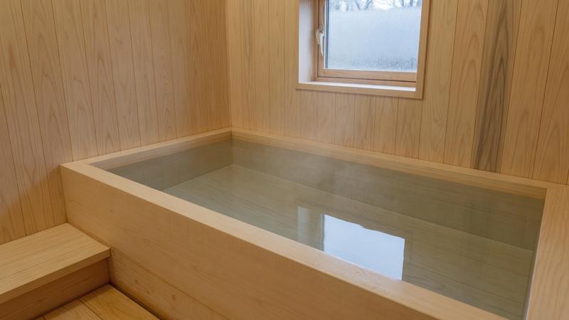 An empty wooden bath